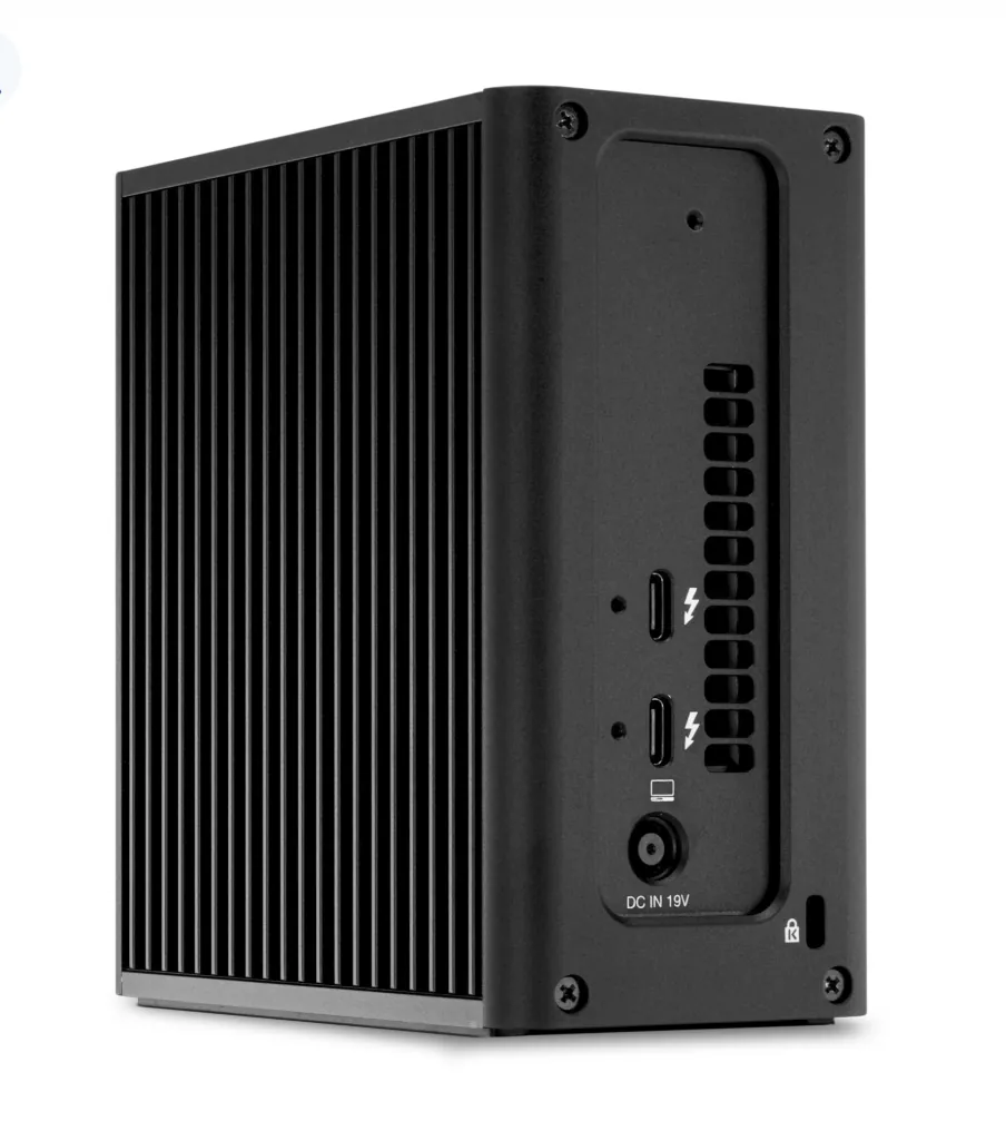 OWC Express 4M2 Ultra compact external SSD enclosure with ribbed aluminum body and rear I O ports visible