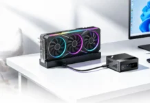 Acemagic F5A Mini PC Starts at $759 With Ryzen AI 9, OCuLink eGPU Acemagic F5A Mini PC connected to external GPU via OCuLink port on a clean desk setup with monitor