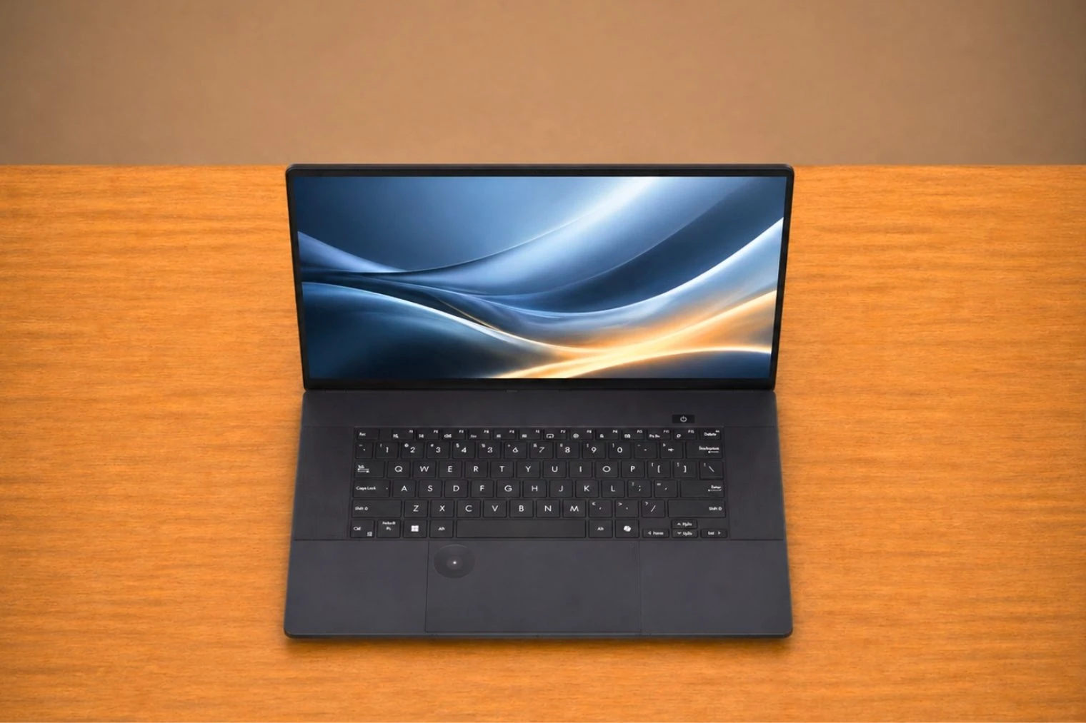 8 Best Laptops for Interior Designer in 2026 53 Top view of ASUS ProArt P16 showing full keyboard layout with large touchpad and professional design.