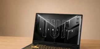 ASUS TUF Gaming F16 Review: Popular Gaming Tested Angled front view of ASUS TUF Gaming F16 highlighting slim bezels, display, and illuminated keyboard.