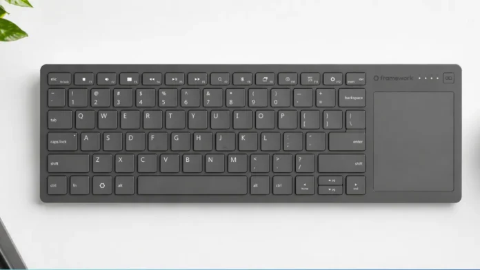 Framework wireless keyboard with large integrated trackpad and compact layout