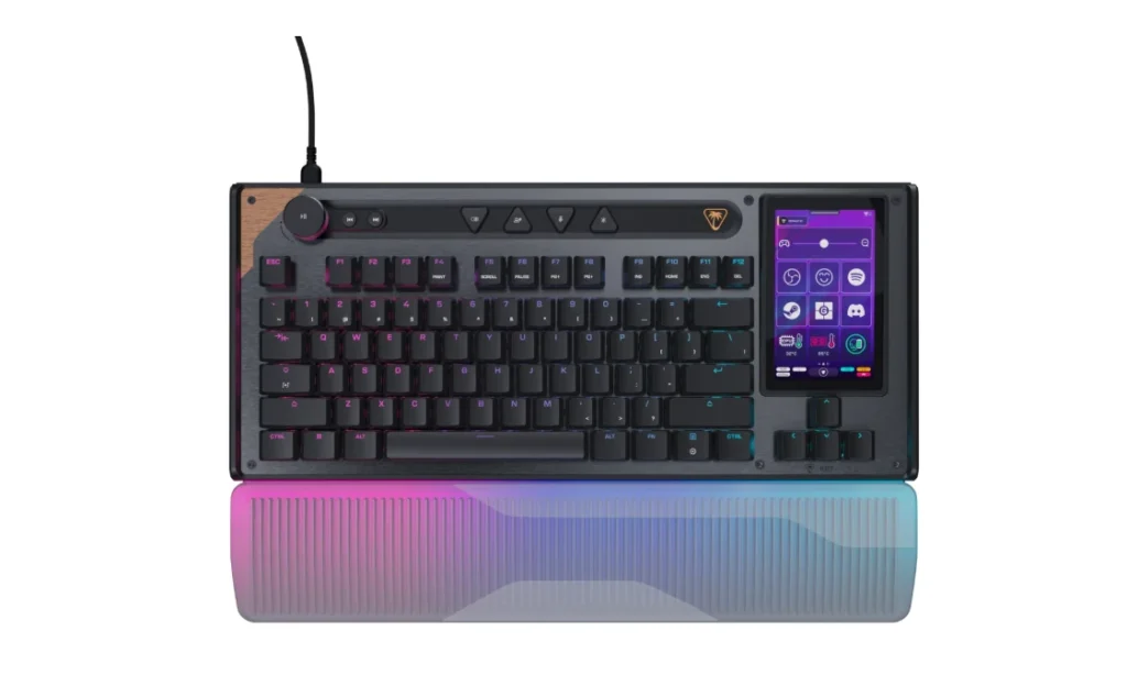 KB7 gaming keyboard compact layout with RGB backlighting, multifunction control dial, built in display screen, and detachable wrist rest with gradient lighting