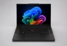 Lenovo ThinkPad T14s Gen 7 Starts Rolling Out With Core Ultra, OLED Display, and 32GB LPDDR5X Lenovo ThinkPad T14s Gen 7 straight front view showing 14 inch display with Windows wallpaper, thin bezels, webcam module, keyboard with TrackPoint, and large trackpad
