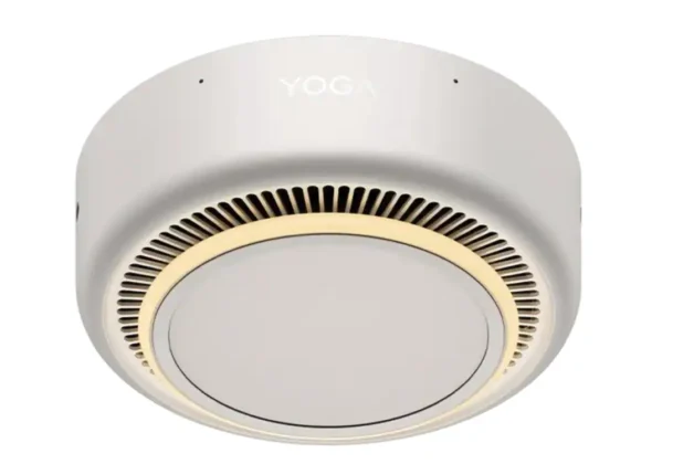 Bottom view of Lenovo Yoga Mini i Gen 11 mini PC showing circular cooling vents and base ring