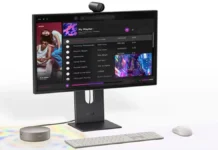 Lenovo Yoga Mini i Gen 11 Starts at £900 With Panther Lake, 4-Display Support Lenovo Yoga Mini i Gen 11 mini PC connected to a monitor with keyboard mouse and webcam on desk