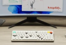 NuPhy Launched Node Keyboards With ISO & JIS Layout Options NuPhy Node keyboard placed on a desk setup with monitor and accessories