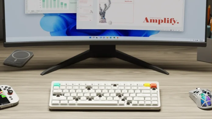 NuPhy Node keyboard placed on a desk setup with monitor and accessories