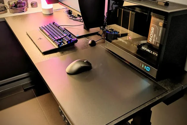 Razer Atlas Pro mouse mat on desk with gaming PC keyboard and mouse in battlestation setup
