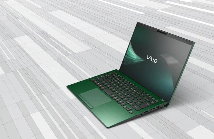 VAIO SX14-R VJS4R2 laptop in green color shown open with display on, featuring slim chassis, full size keyboard, large trackpad, and modern lightweight design