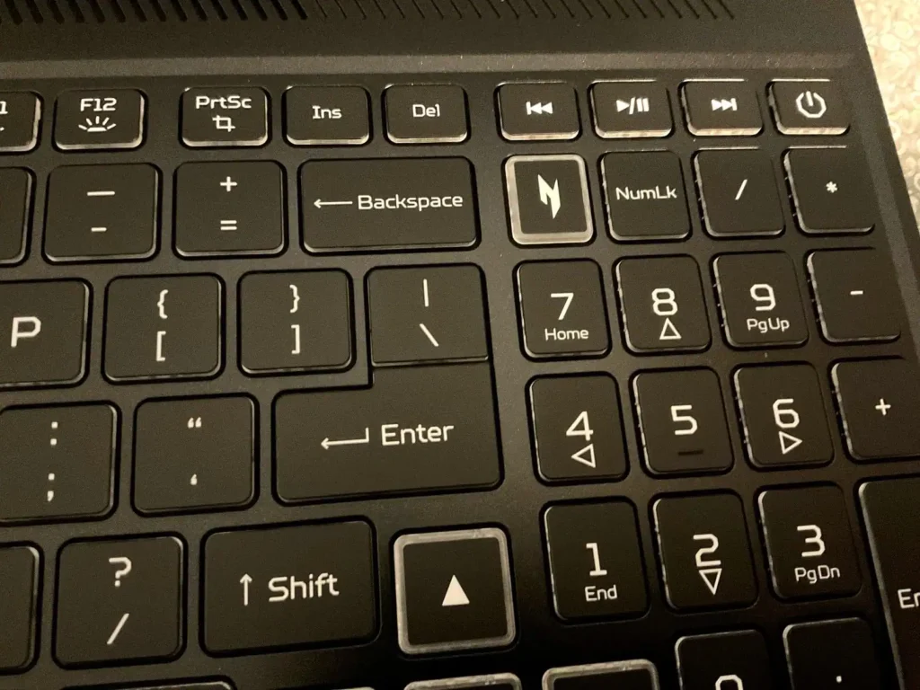 close-up view of the Acer Nitro V 16S AI keyboard with numpad and media shortcut keys