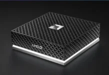 AMD Releases Ryzen AI Halo With 128GB Memory and Ryzen AI Max+ 395 compact AMD Ryzen AI Halo Developer Platform mini PC with geometric black chassis design displayed on dark background