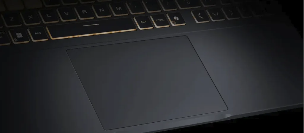 ASUS TUF Gaming F16 Review: Popular Gaming Tested 43 Close-up view of the large trackpad on ASUS TUF Gaming F16 laptop.