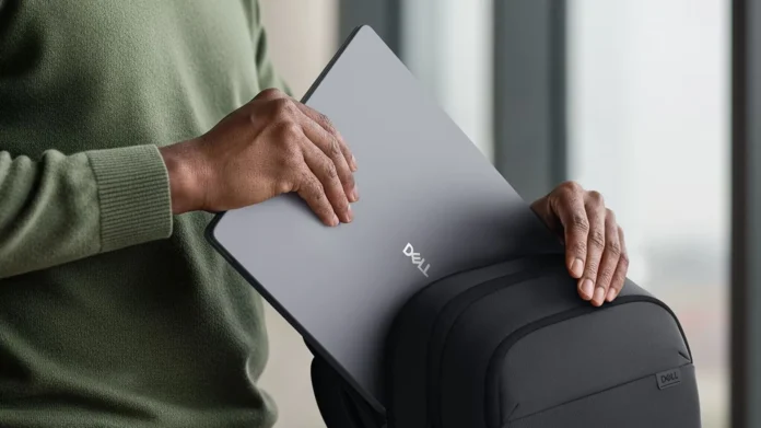 Dell Pro 5 16 P516260 laptop being placed into a backpack showing slim and portable design