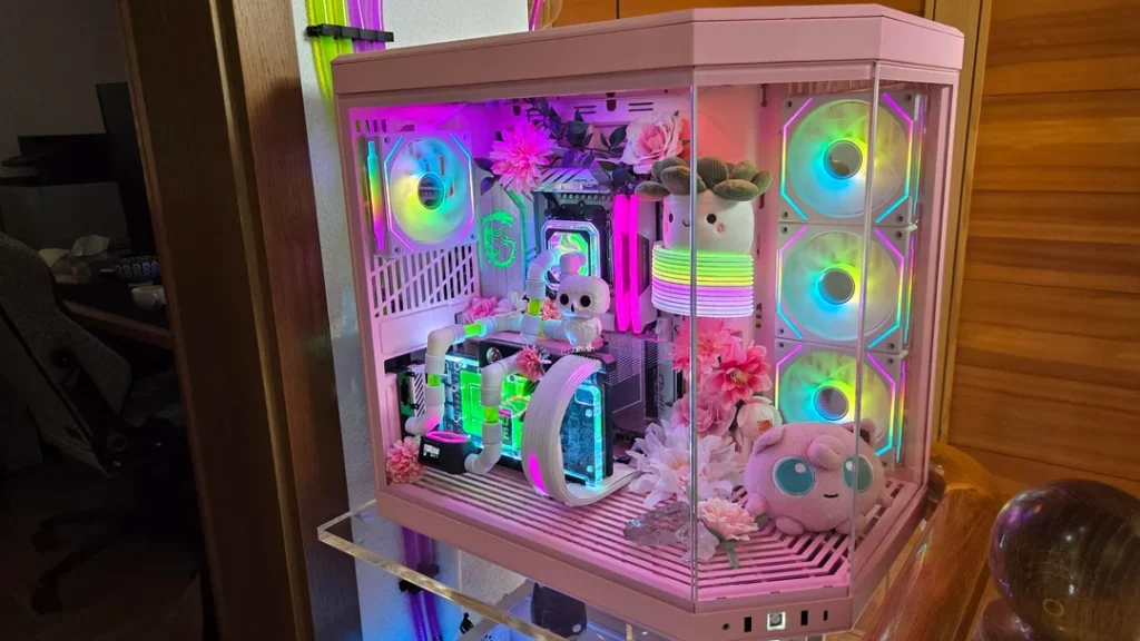 Two custom Ryzen 7 7800X3D gaming PCs with pastel-themed liquid cooling and RGB lighting