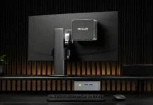 GMKtec Releases NucBox M3 Pro Mini PC With Core i5-13500H, Dual 2.5GbE GMKtec NucBox M3 Pro mini PC mounted behind a monitor in a clean desktop workspace