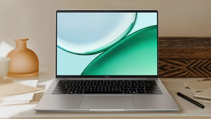 Honor Notebook X14 laptop placed on a desk with display turned on