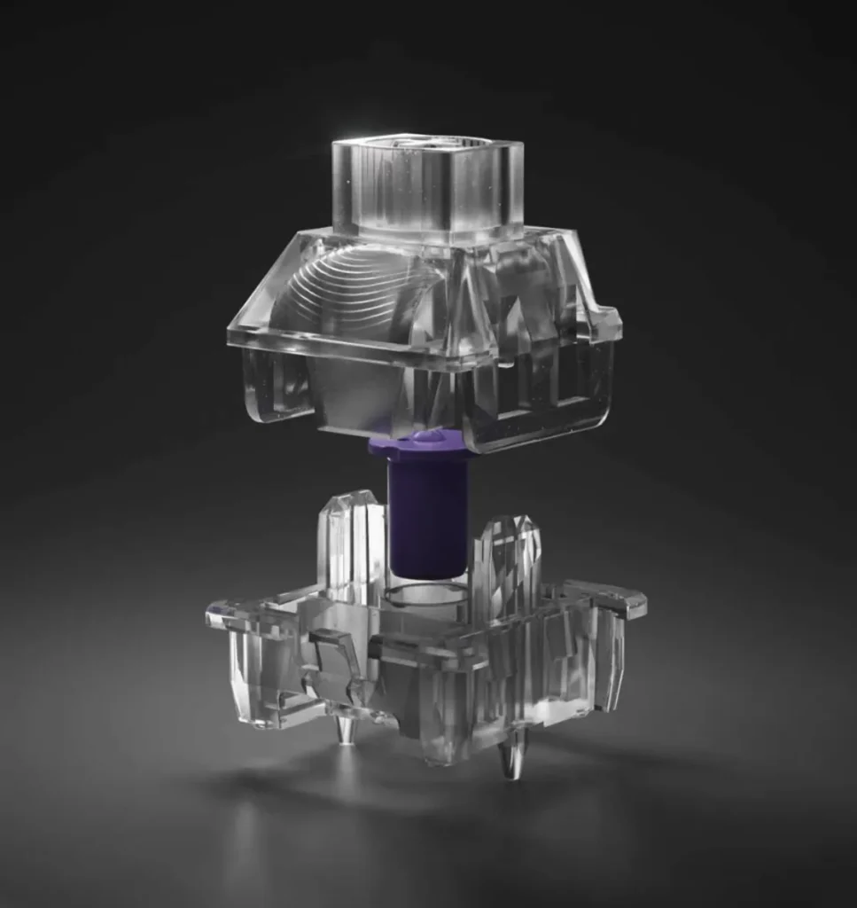 Transparent Keytok Nova magnetic switch with purple stem for Hall effect gaming keyboards