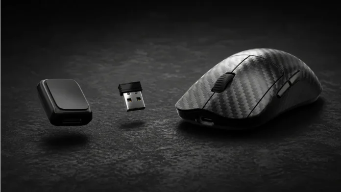 Mionix Avior Air carbon fiber gaming mouse with USB dongle and accessory module