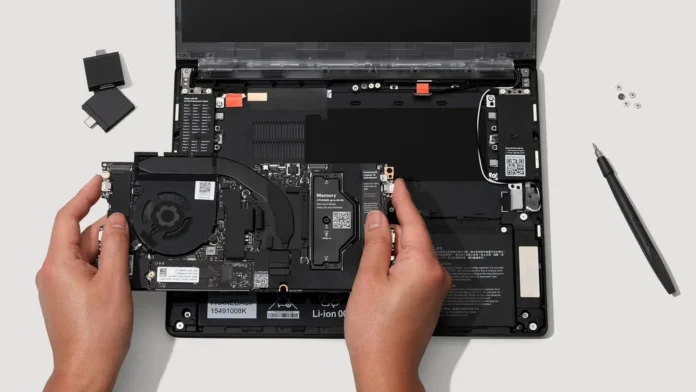 Framework Laptop 13 Pro standalone mainboard with an Intel Core Ultra Series 3 processor and LPCAMM2 memory slot, shown on a clean workspace.