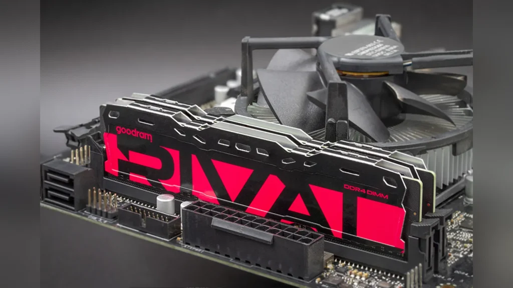Pair of Goodram RIVAL DDR4 RADIANT memory modules with green heatsinks on black PCBs.