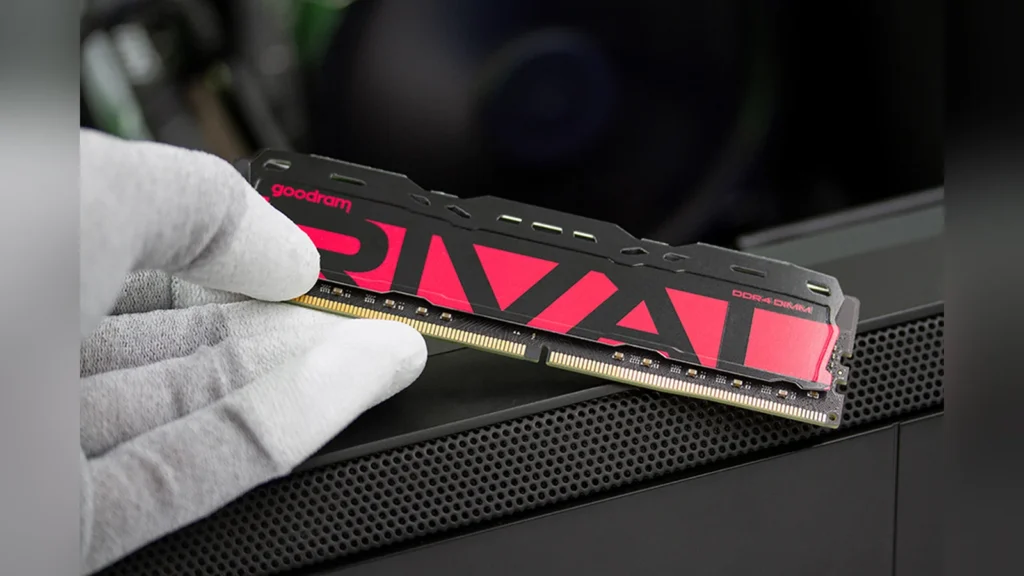 Pair of Goodram RIVAL DDR4 RADIANT memory modules with red heatsinks on black PCBs.