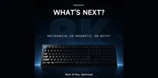 Keychron Teases V6 Keyboard With Hybrid TMR Sockets Front view of the black Keychron V6 Evolution full-size hybrid gaming keyboard on a dark background with blue lighting effects.
