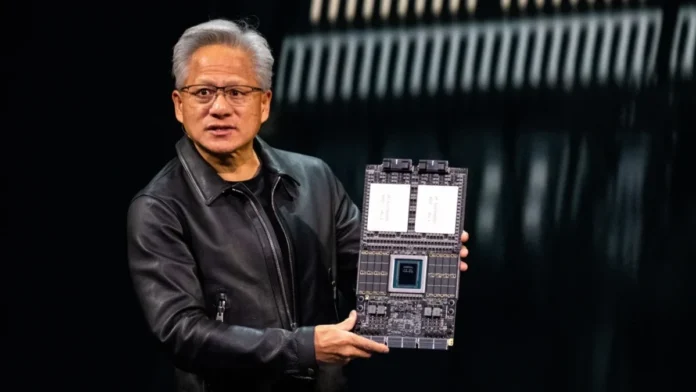 NVIDIA CEO Jensen Huang holding the new Vera Rubin superchip/board on stage.
