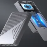 Orico CNM2-U4-GY USB4 SSD enclosure with active cooling fan and aluminum alloy housing opened to reveal internal NVMe storage support.