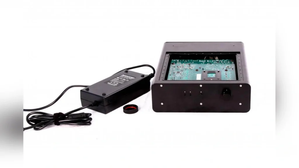 Silent PC Sells Fanless IP65-Rated Ryzen 9000 Desktop for $3,350 2 Silent PC waterproof computer chassis showing the power brick connection and vertical alignment.