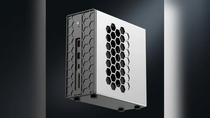 Professional product shot of the silver-white AooStar mini PC standing upright on a reflective dark studio floor.