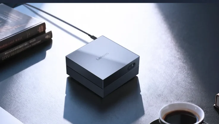 Lenovo AI Host Mini PC connected on a desk with accessories and workspace setup