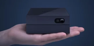 Lenovo AI Host Mini Desktop PC Pairs Cixin P1 ARM Chip With 45 TOPS Lenovo AI Host Mini PC shown in a hand highlighting its compact form factor