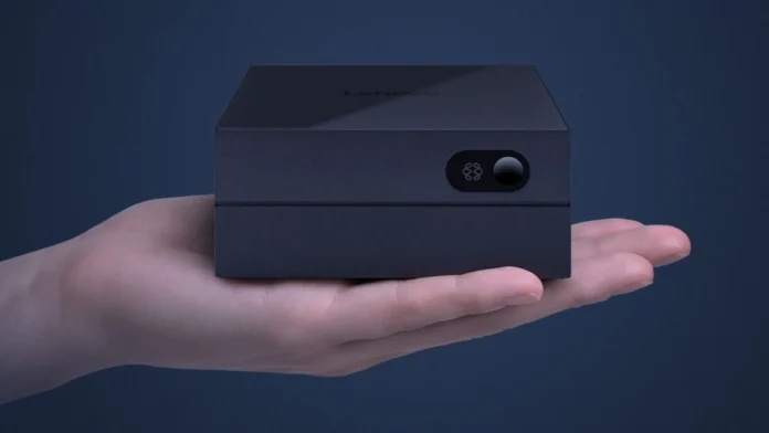 Lenovo AI Host Mini PC shown in a hand highlighting its compact form factor