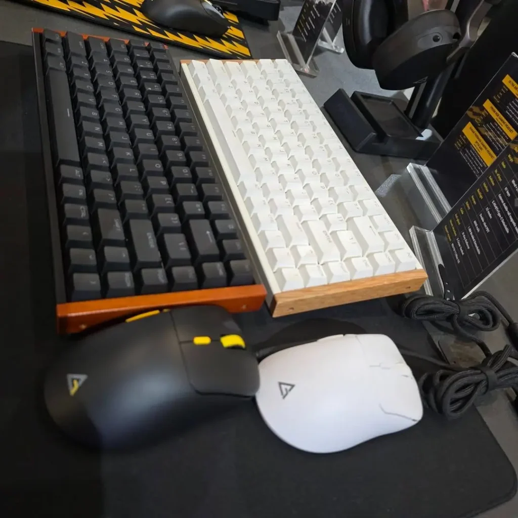 Antec mechanical keyboards and gaming mice displayed at Computex 2026 featuring black and white keyboard designs
