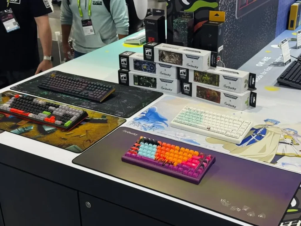 Various custom-themed Ducky keyboards and accessories displayed at Computex