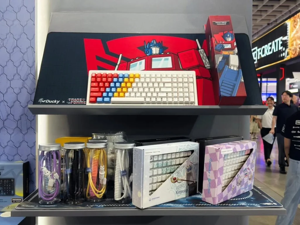 Ducky keyboard accessories, cables, keycaps, and collaboration products on display