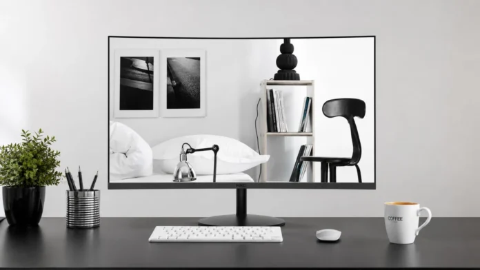 Front view of the HKC M27A9F1 27-inch curved monitor displayed on a desktop setup.