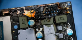 RTX 5090 Burn Damage Destroys GPU and VRAM, Warranty Reportedly Rejected Detailed view of burn damage around the power delivery area on an RTX 5090 graphics card PCB.
