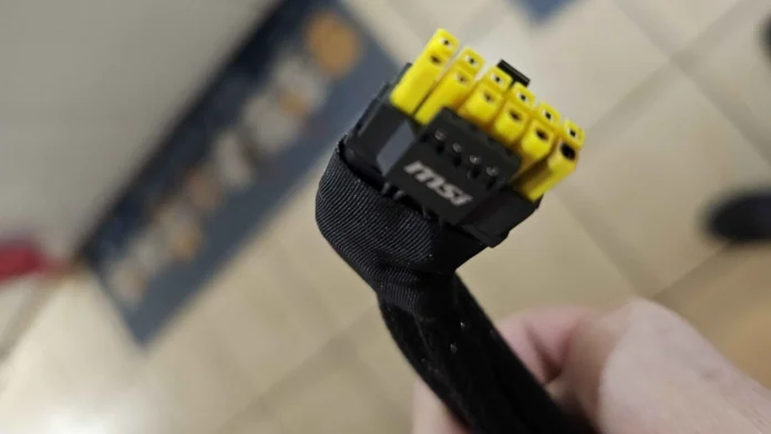 Close-up of a damaged 16-pin power connector reportedly used with an RTX 5090 graphics card