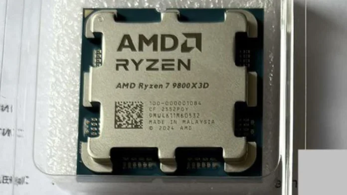 Close-up photo showing a tray-version AMD Ryzen 7 9800X3D processor in its plastic protective casing.