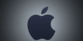 Apple Tests DRAM Chips from Blacklisted Chinese Memory Maker Front view of the isolated dark Apple logo centered on a custom silver-grey gradient spotlight backdrop.