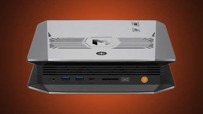 The front perspective view of the BOSGAME M5 mini PC isolated on a premium orange and charcoal radial gradient backdrop.