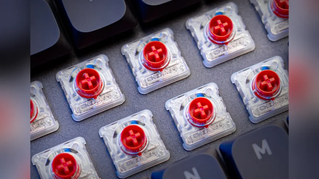 Cherry Xtrfy Launches K63W Pro Compact UWB Gaming Keyboard 4 Macro shot of the CHERRY MX Low Profile 2.0 mechanical red switches on the keyboard board.