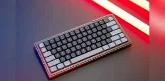 Cherry Xtrfy Launches K63W Pro Compact UWB Gaming Keyboard The Cherry Xtrfy K63W Pro Compact gaming keyboard angled on a desk with glowing red and orange backlights.