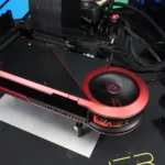 Der8auer Converts $7,000 RTX 5090 LIGHTNING Z to Custom Water Cooling 2 The flagship custom liquid-cooled GeForce graphics card mounted on a test bench next to a keyboard.