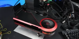 Der8auer Converts $7,000 RTX 5090 LIGHTNING Z to Custom Water Cooling The flagship custom liquid-cooled GeForce graphics card mounted on a test bench next to a keyboard.