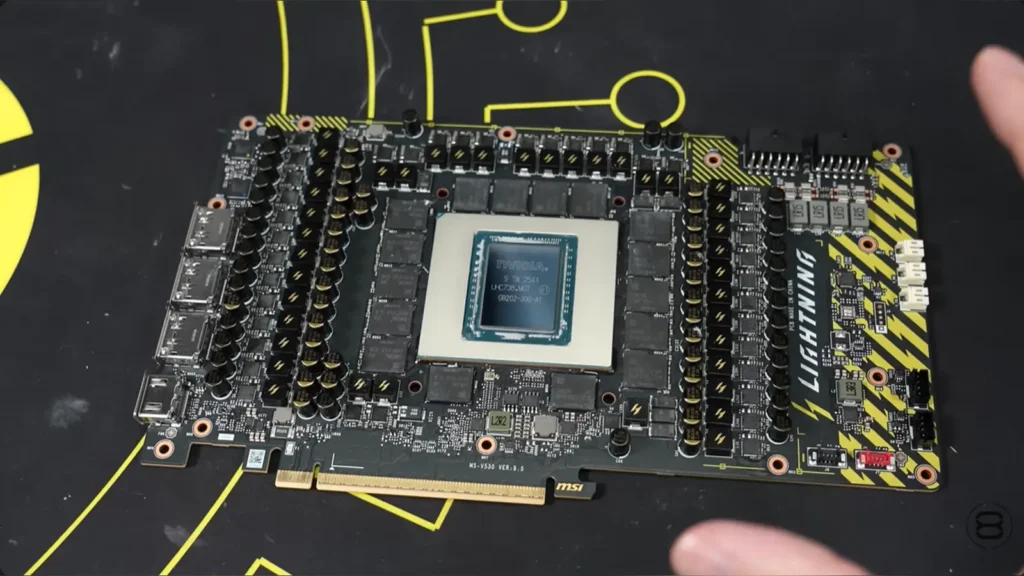 Der8auer Converts $7,000 RTX 5090 LIGHTNING Z to Custom Water Cooling 6 Close-up of the graphics card water block and standard custom-loop G1/4 fittings.