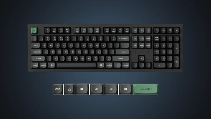Isolated view of the Keychron K10 Ultra wireless mechanical keyboard with extra keycaps on a custom slate blue gradient backdrop.