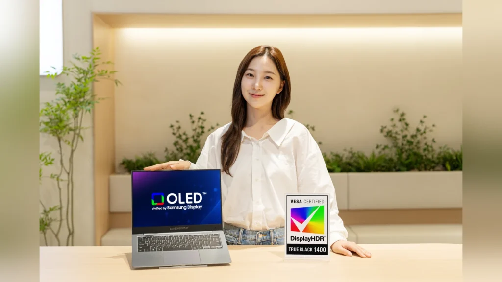 Samsung’s New Laptop OLED Hits 1,600 Nits and Lasts Twice as Long 1 Close-up of the Lenovo Yoga Pro 9i Aura Edition laptop showing the vibrant color and brightness levels of the tandem OLED display.