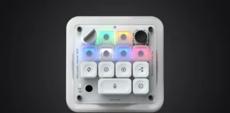 OpenAI Announces Codex Micro AI Assistant Keypad Top-down view of the OpenAI Codex Micro keypad isolated on a premium charcoal and black radial gradient backdrop.